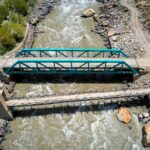 Aerial view of two bridges over the turbulent Zanskar River in India.