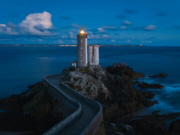 Night view of Petit Minou lighthouse on the coast of Brittany, France.