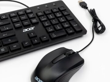 Close-up of a black Acer keyboard and mouse set against a white background.
