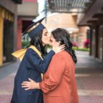 A touching moment of a graduate kissing her mother in Guayaquil, Ecuador.