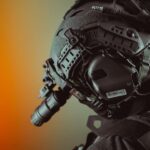 Close-up of a tactical helmet equipped with night vision gear, emphasizing technology.