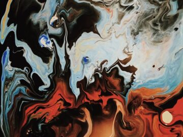 Dynamic abstract painting featuring vibrant swirling colors and expressive acrylic patterns.