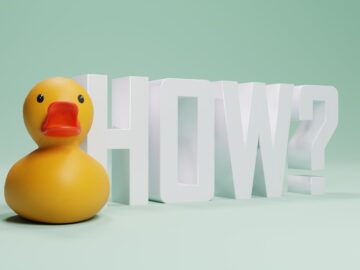 A playful rubber duck next to the word HOW against a green background.