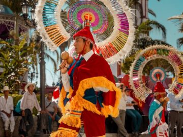 Vibrant festival celebrating indigenous dance and culture in Cuetzalan, Mexico.