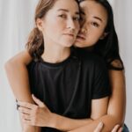 Portrait of an affectionate couple embracing, highlighting love and diversity.