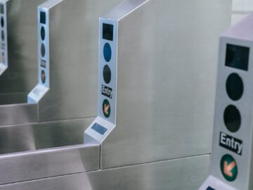 Close-up of a contemporary subway turnstile in a station. Modern design and functionality.