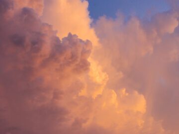 Captivating sunset clouds with dramatic colors against a blue sky.