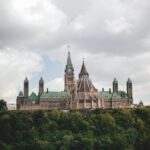 Stunning view of the Gothic Revival Parliament Hill buildings in Ottawa during summer.