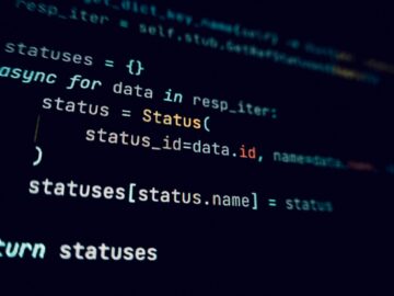 Detailed view of programming code in a dark theme on a computer screen.