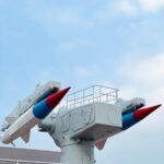 Close-up of a missile launcher against a clear blue sky in Bin Hai Xin Qu, China.