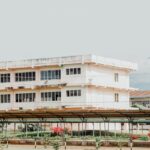 Contemporary architecture of a school building in Valencia, Spain with open courtyard space.