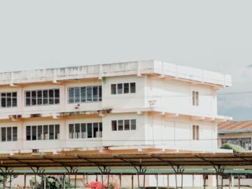 Contemporary architecture of a school building in Valencia, Spain with open courtyard space.