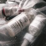 Skincare products by The Ordinary, encapsulated in a moisture-rich setup, highlighting hydration.