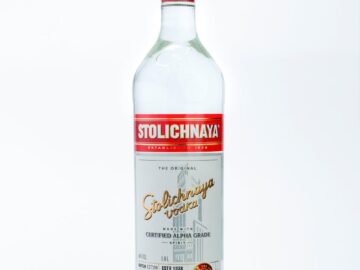 High-quality image of Stolichnaya vodka bottle with clean white background, perfect for beverage marketing.