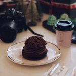 Chocolate pastry served with coffee. Ideal for indulgent food moments