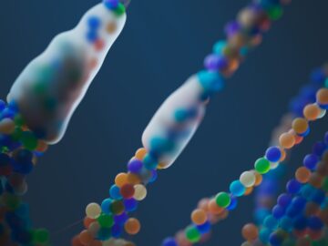 Close-up of a colorful abstract representation of DNA strands, illustrating science and genetics.