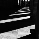 High contrast black and white photo of dramatic architectural shadows.