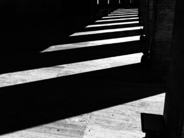 High contrast black and white photo of dramatic architectural shadows.