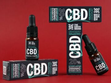 CBD oil products in packaging on display, highlighting sports and wellbeing benefits.
