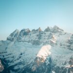 Captivating winter landscape of snowy Dents du Midi in Val-d'Illiez, Switzerland.