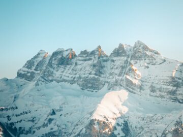 Captivating winter landscape of snowy Dents du Midi in Val-d'Illiez, Switzerland.