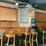 Warm and inviting wooden interior of a traditional Korean restaurant in Seoul, South Korea.