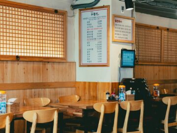 Warm and inviting wooden interior of a traditional Korean restaurant in Seoul, South Korea.