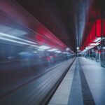 A swift train in a modern subway station, capturing the essence of speed and technology.