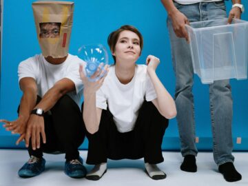 A humorous take on pandemic protection with creative use of household items indoors.