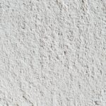 Close-up of a textured kaolin clay surface showcasing natural patterns.