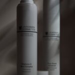 Modern product shoot of Janssen cosmetics against a white background highlighting minimalist design.