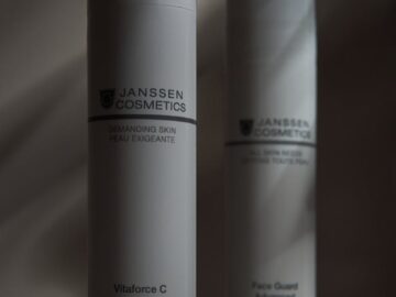 Modern product shoot of Janssen cosmetics against a white background highlighting minimalist design.