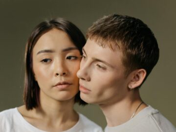 Close-up portrait of a thoughtful couple with an intimate connection.