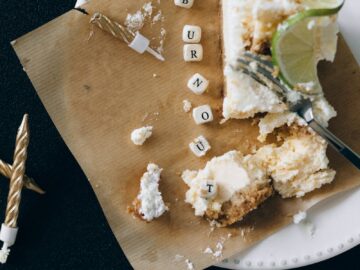 A slice of cake with burnout blocks on a plate, symbolizing stress and exhaustion.