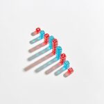 Artistic arrangement of red and blue dice casting long shadows on a white background.