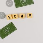 A minimal flat lay of a scam concept using dice and fake currency on a gray surface.