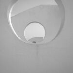 Captivating abstract view of a spiral staircase in black and white.