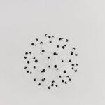 Abstract representation of a molecular structure in a geometric model on a plain white background.