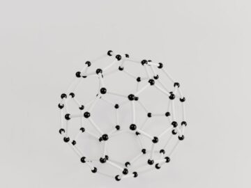 Abstract representation of a molecular structure in a geometric model on a plain white background.