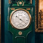 Classic barometer with ornate design, perfect for vintage decor enthusiasts.