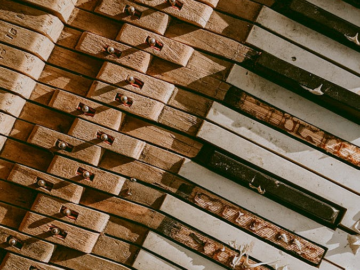 Detailed shot of old and broken piano keys showcasing vintage decay.