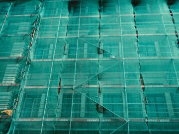 scaffolding covered by green net