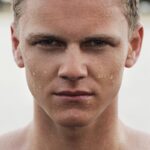 man with water sparkles