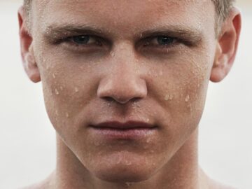 man with water sparkles