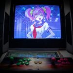 black flat screen tv turned on showing woman in blue dress