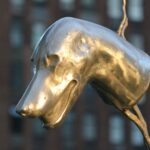 a close up of a statue of a dog's head