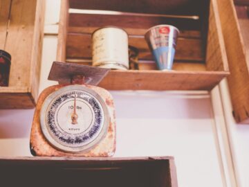 closeup photography of brown analog scale